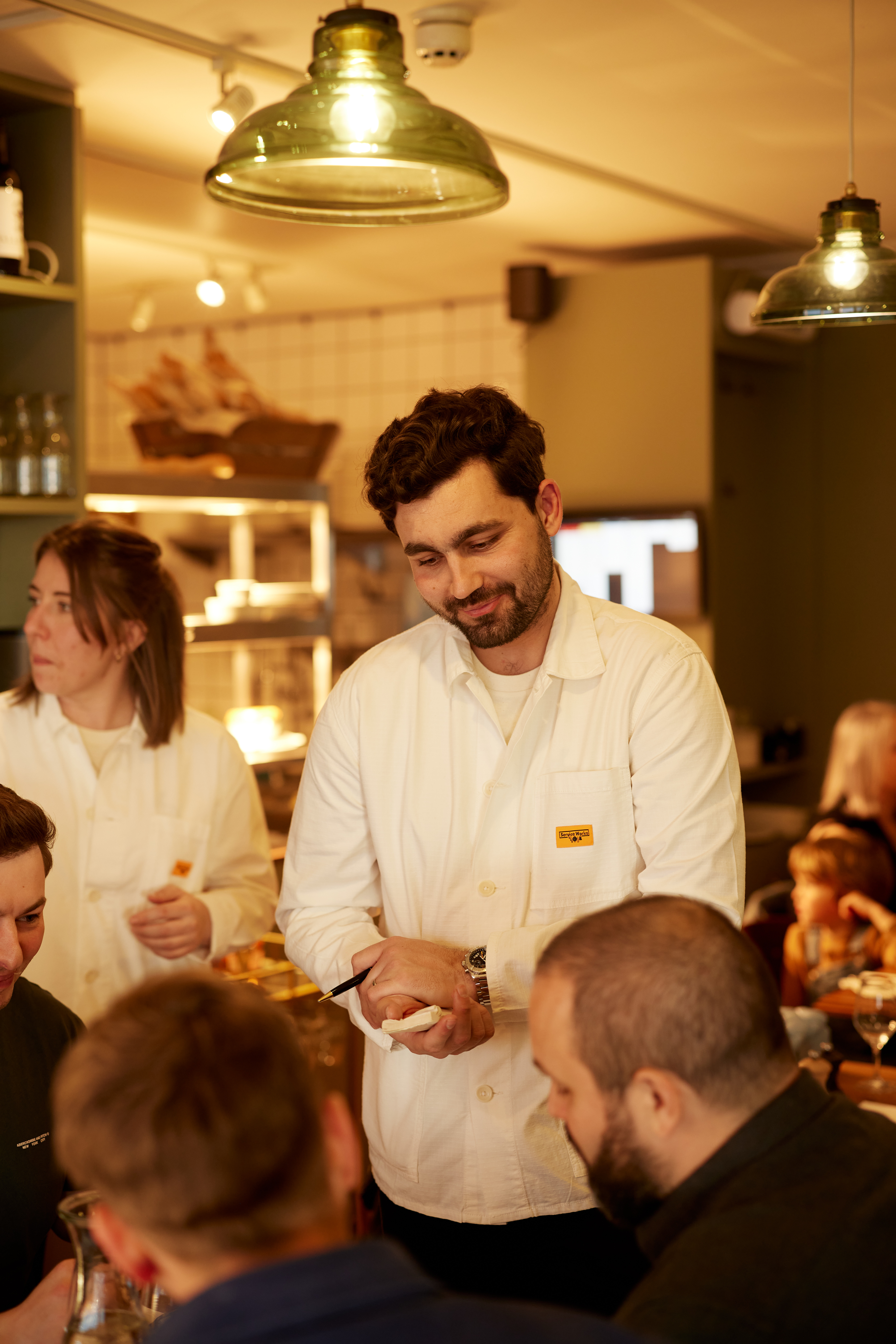 Dan O'Regan on the floor at Lapin, mid-service